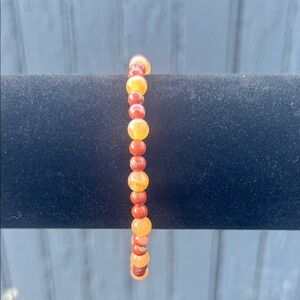 Elegant Orange and Red Beaded Bracelet